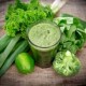 21362449-healthy-green-vegetable-juice-on-wooden-table